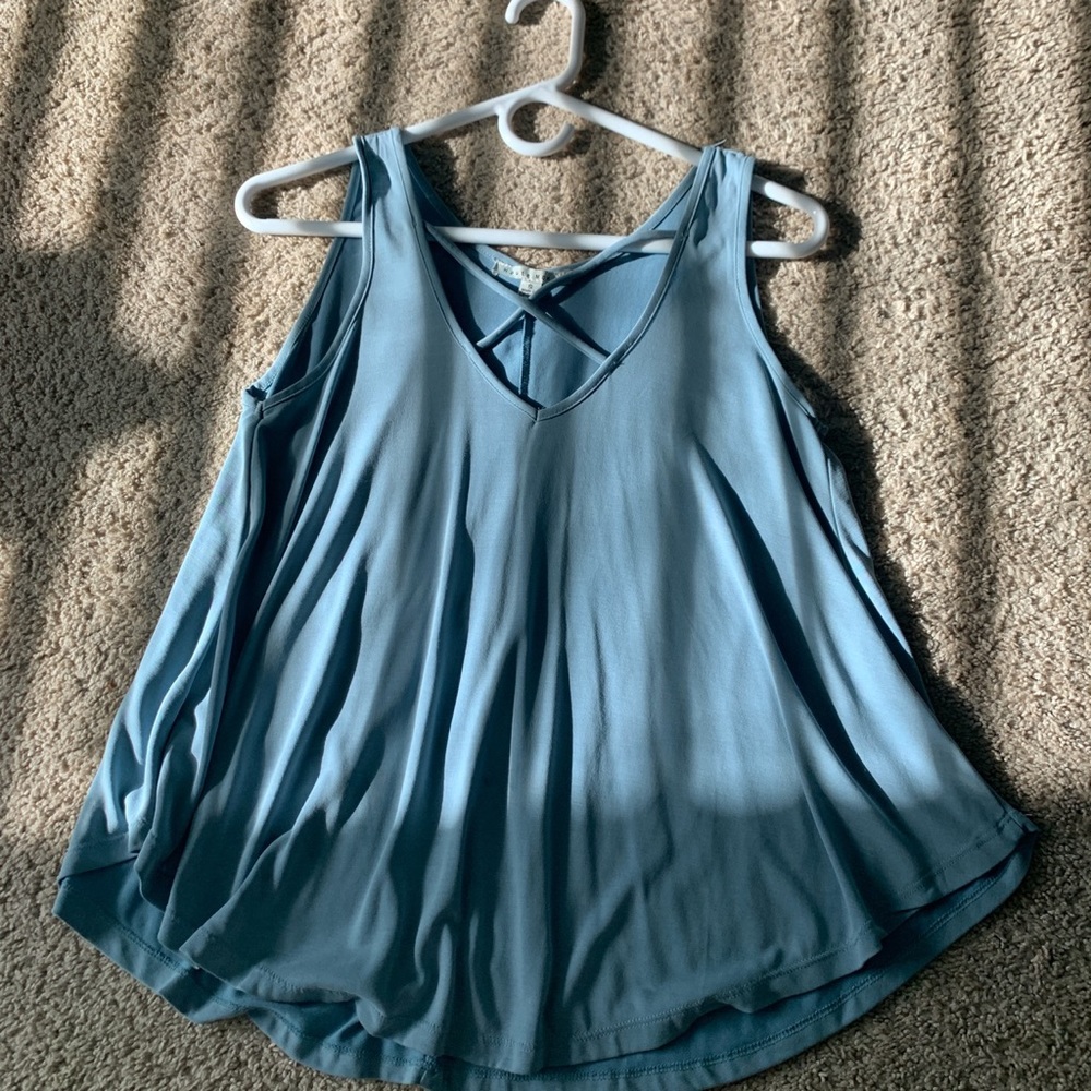 soft blue with cross strings on chest